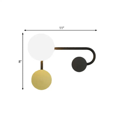 Modern black and gold planter sconce with white frosted glass globe and curved arm for 110v-120v living room use