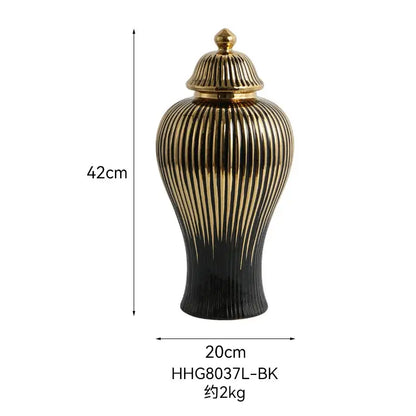 Elegant black and gold ceramic ginger jar vase with vertical ribbed detailing and matching golden lid for living room decor