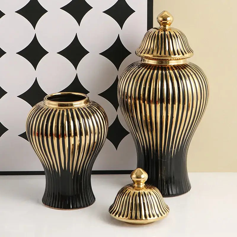 Elegant black and gold ceramic ribbed ginger jar vase set with matching lids for modern living room decor
