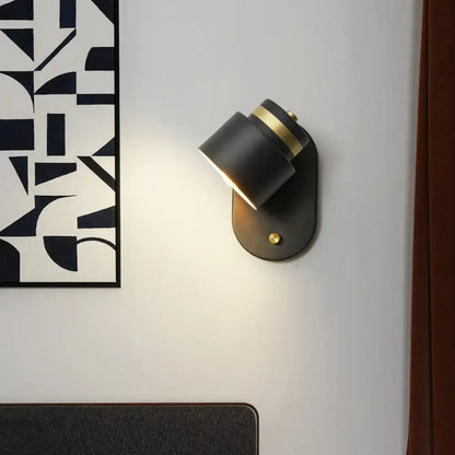 Modern black and gold rotatable led light bedroom wall sconce with matte finish and adjustable design