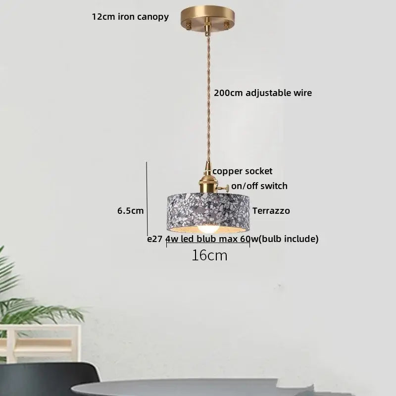 Modern black and gold terrazzo stone pendant lamp with gray white cylindrical shade and decorbites black terrazzo iron canopy
