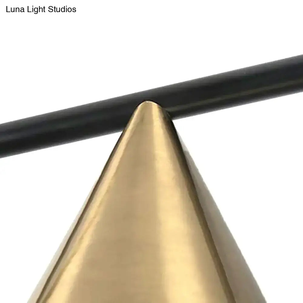 A sleek polished brass cone on decorbites™ contemporary black gold metal linear chandelier with three lights for islands