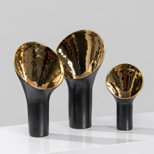 Set of three modern black and gold trumpet ceramic flower vases with glossy black exterior for living room decorbites golden trumpet