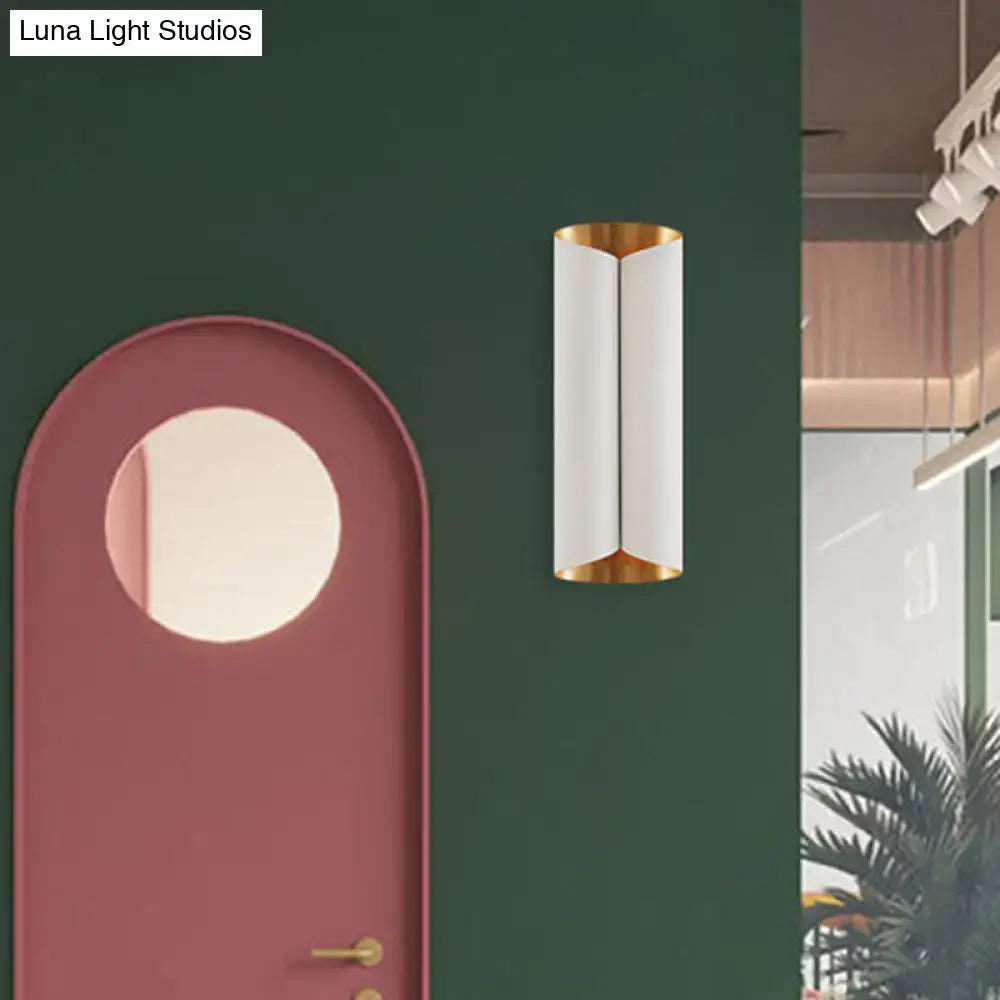 Modern black and gold twisted light fixture porch wall sconce with white frosted glass and gold-toned metal bulb base