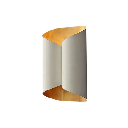 Modern black and gold twisted porch wall sconce light fixture with matte white exterior and warm gold bulb base interior