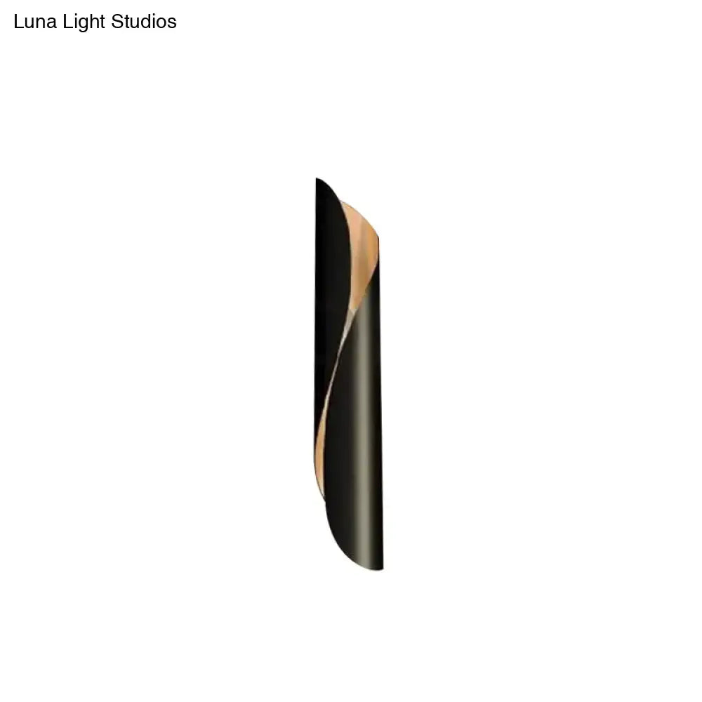 Modern black and gold twisted wall sconce light with a sleek minimalist design for corridor wall sconce use