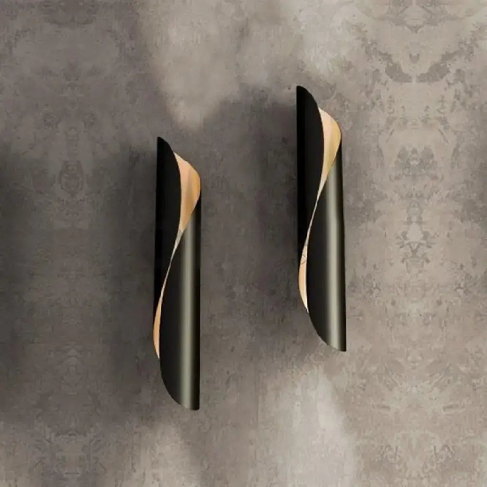 Modern black and gold twisted wall sconce light with sleek design ideal for corridor wall sconce lighting