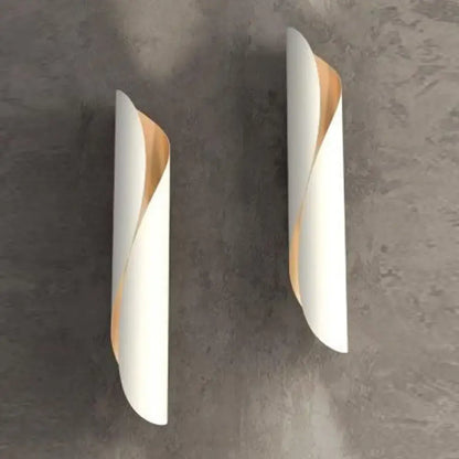 Modern white and gold leaf wall sconce light with sleek twisted design ideal for corridor wall sconce use