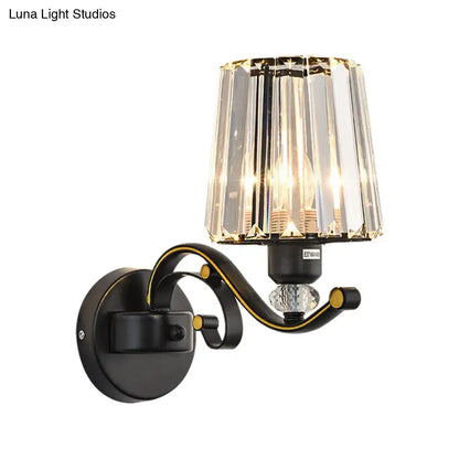 Modern black and gold wall lamp with clear glass faceted crystal shade for elegant bedroom lighting sconce