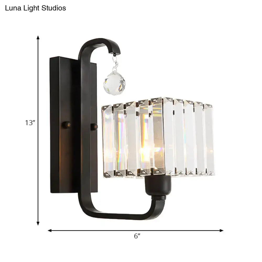 Modern black wall sconce with rectangular crystal shade and faceted crystal accent for living room wall lamp