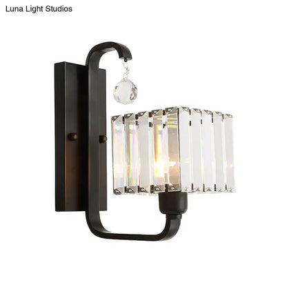 Modern black metal wall sconce with rectangular crystal shade and faceted crystal accent for living room wall lamp