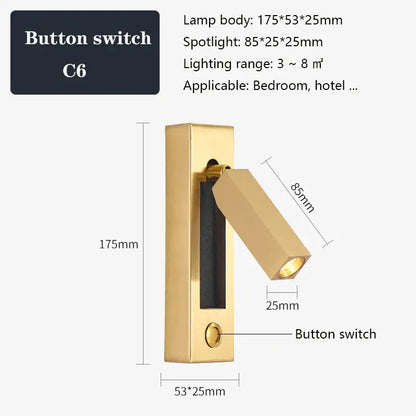 Modern black brass wall sconce with gold-finished adjustable spotlight and integrated button switch for bedroom reading light