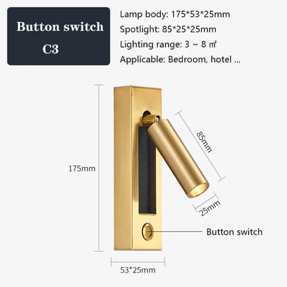 Gold-finished wall sconce with black brass sleek rectangular body and adjustable cylindrical head for bedroom reading light