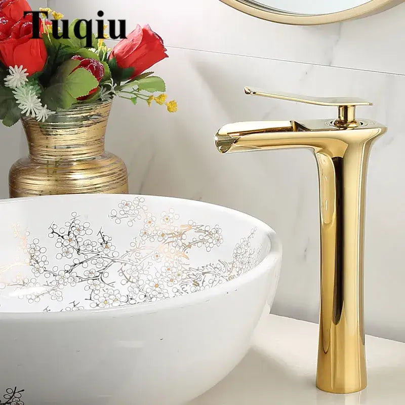 Modern black and gold waterfall basin faucet with sleek tall gold finish and single lever handle for gold waterfall bathroom decorbites