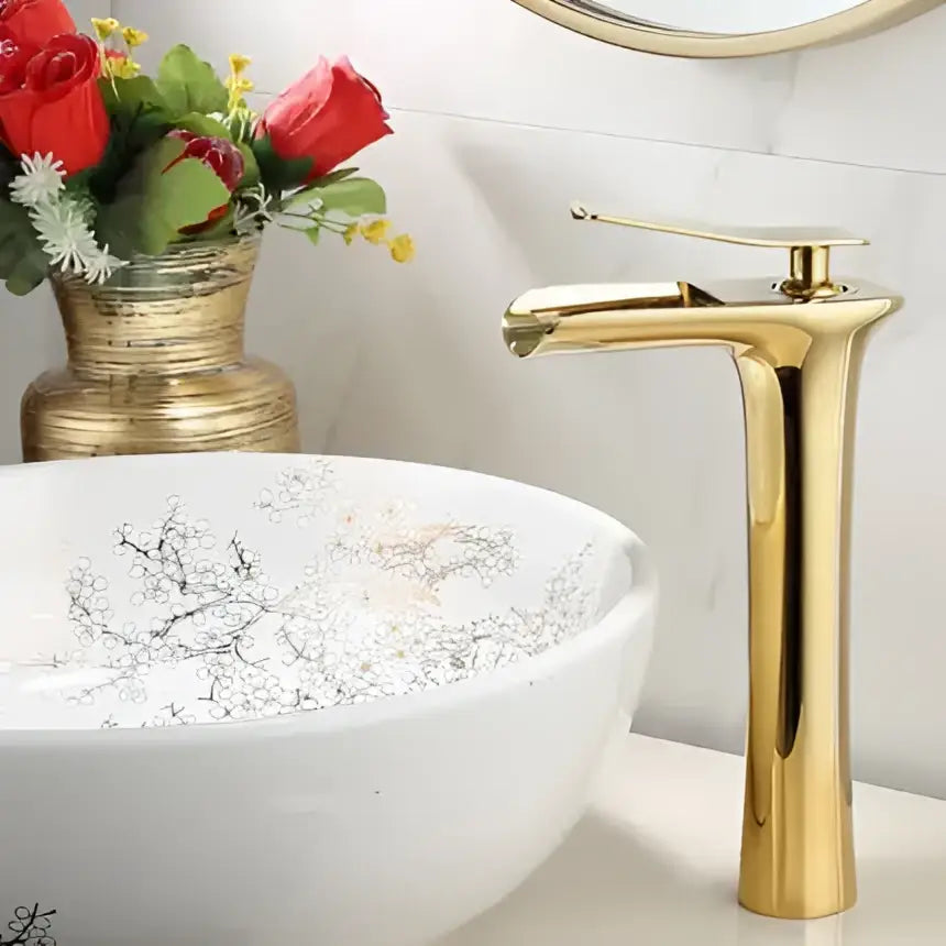 Modern black and gold waterfall basin faucet with gold-finished sleek cylindrical spout for gold waterfall bathroom decorbites