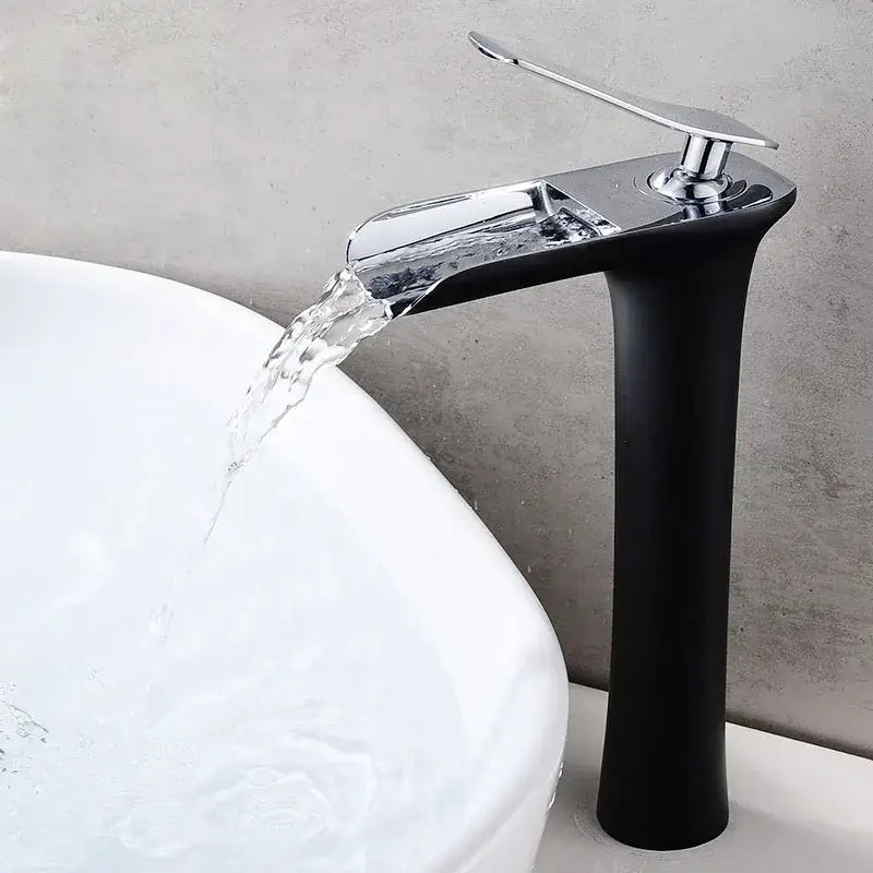 Modern black and gold waterfall basin faucet with sleek chrome accents flowing water into white sink decorbites gold waterfall bathroom mixer tap