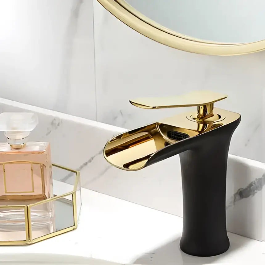 Modern black and gold waterfall basin faucet with sleek two-tone decorbites gold waterfall design for bathroom use