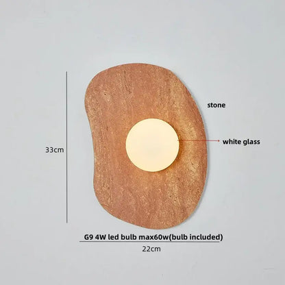 Modern black and green marble wall sconce with rustic green marble stone base and smooth white glass disc by decorbites