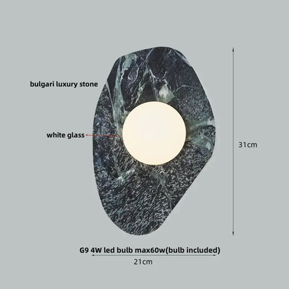 Modern wall sconce featuring a dark veined bulgari luxury green marble stone with a white glass circle center for decorbites decor