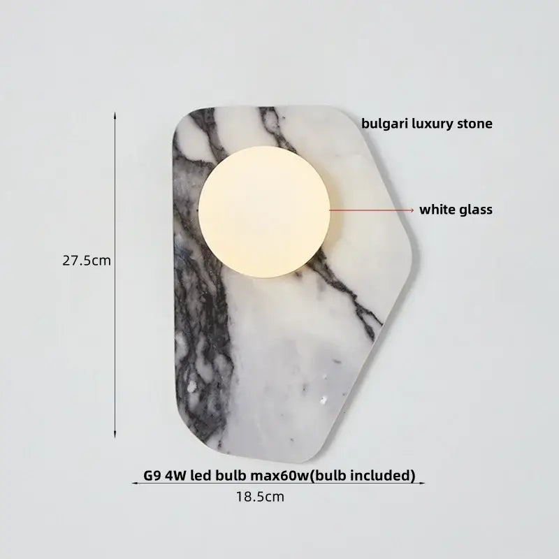 Modern black and green marble wall sconce with a hexagonal white marble base and green marble stone decorbites detail