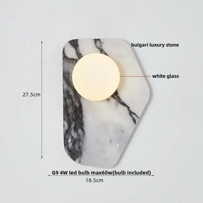 Modern black and green marble wall sconce with a hexagonal white marble base and green marble stone decorbites detail