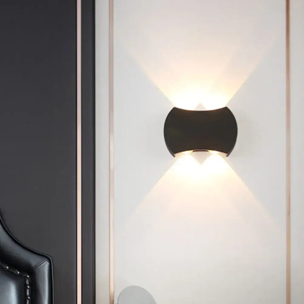 Modern black hexagonal led wall washer sconce with sleek curved design emitting warm light for hallway lighting wall light
