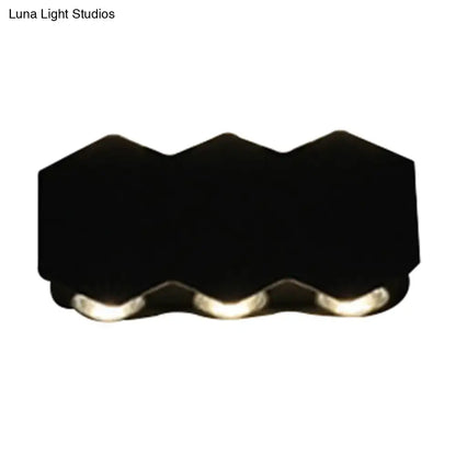Modern black hexagonal wall washer sconce with three integrated led lights for hallway wall light illumination