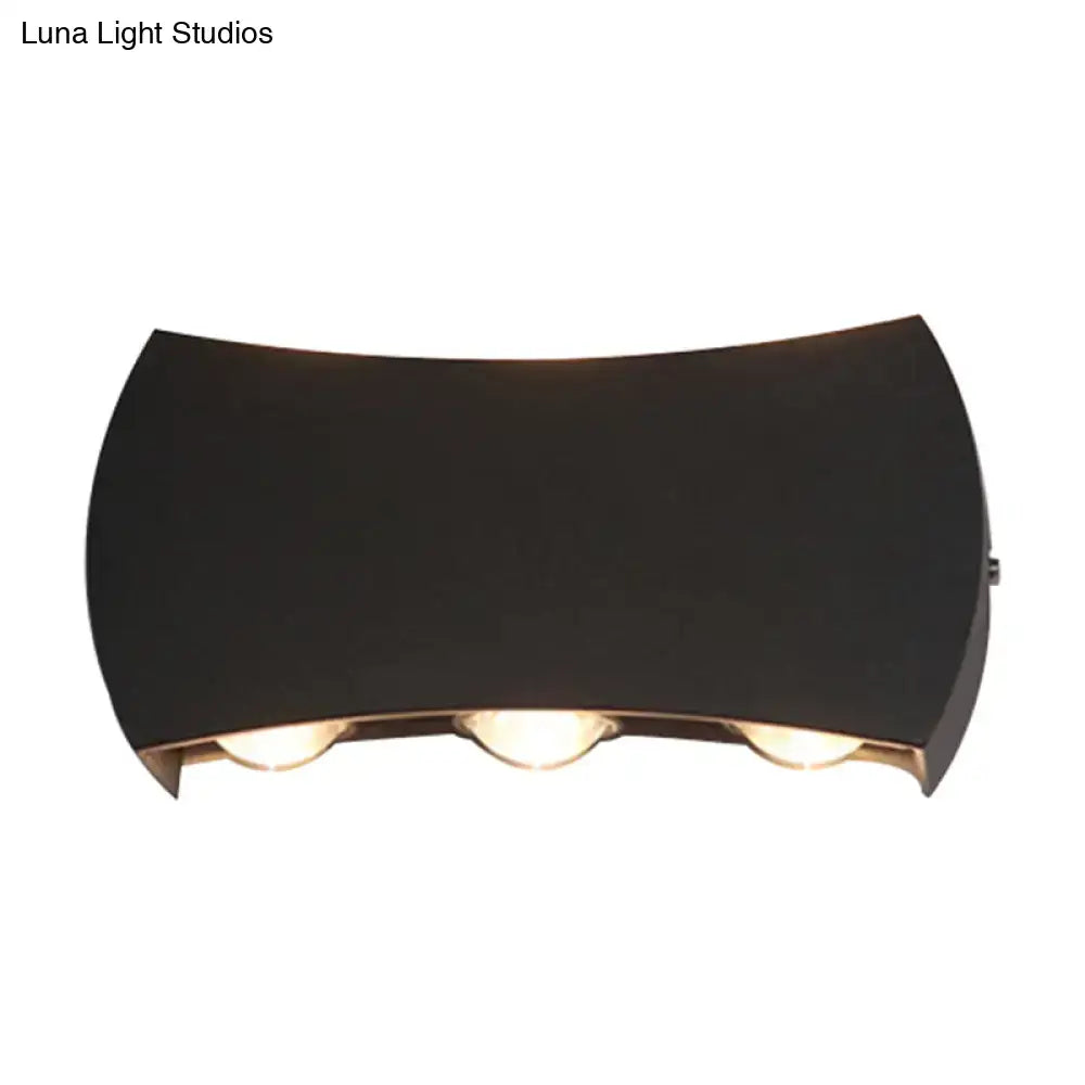 Modern black hexagonal led wall washer sconce with three warm-toned lights for hallway wall lighting