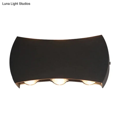 Modern black hexagonal led wall washer sconce with three warm-toned lights for hallway wall lighting