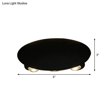 Modern black oval ceiling wall washer sconce with three recessed led bulbs for hallway lighting