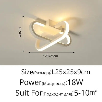 Modern white led wall sconce with sleek intertwined loop design complements decorbites elegant ceiling chandeliers