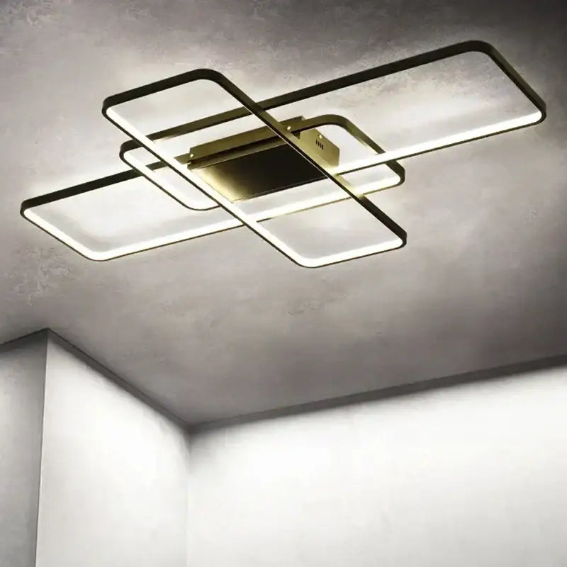 Modern black intersecting rectangular decorbites dimmable ceiling light with sleek frame and glowing white illumination