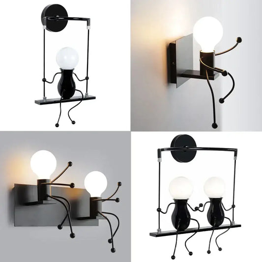 Modern black iron wall sconce with whimsical articulated figures holding glowing bulbs for creative led wall decorbites decor