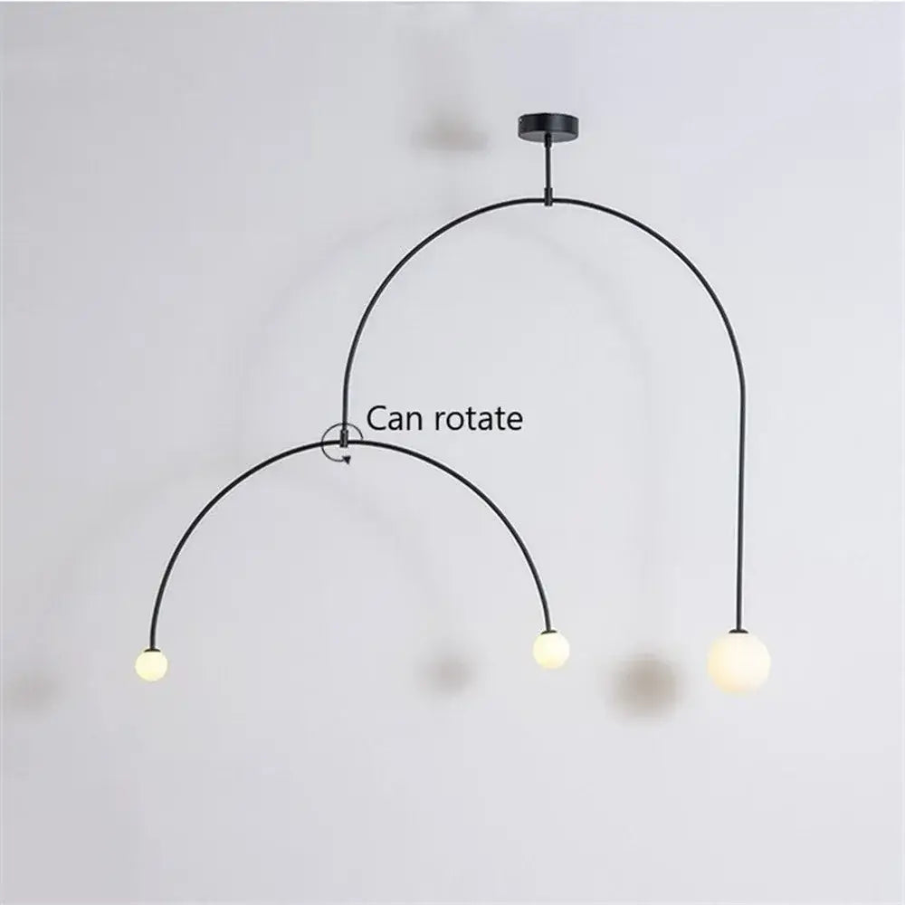 Modern black iron line chandelier with three frosted glass bulbs and rotating arc design for living room decorbites iron line