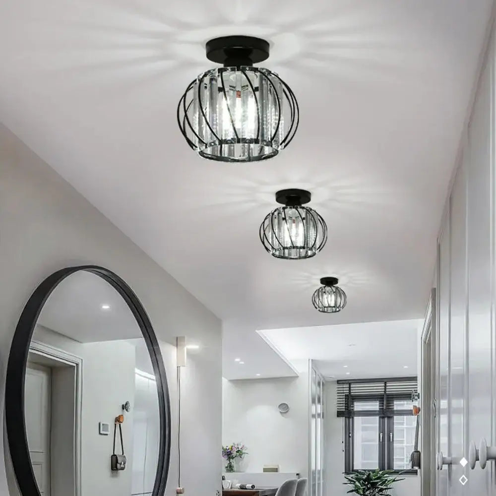 Modern black iron round crystal ceiling chandelier with black metal cage and clear glass panels for dining room decorbites iron round