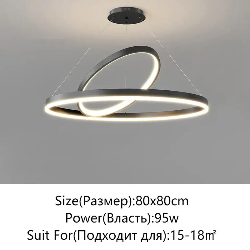 Modern black irregular ceiling chandelier with two interlocking LED rings emitting warm glow by decorbites irregular ceiling