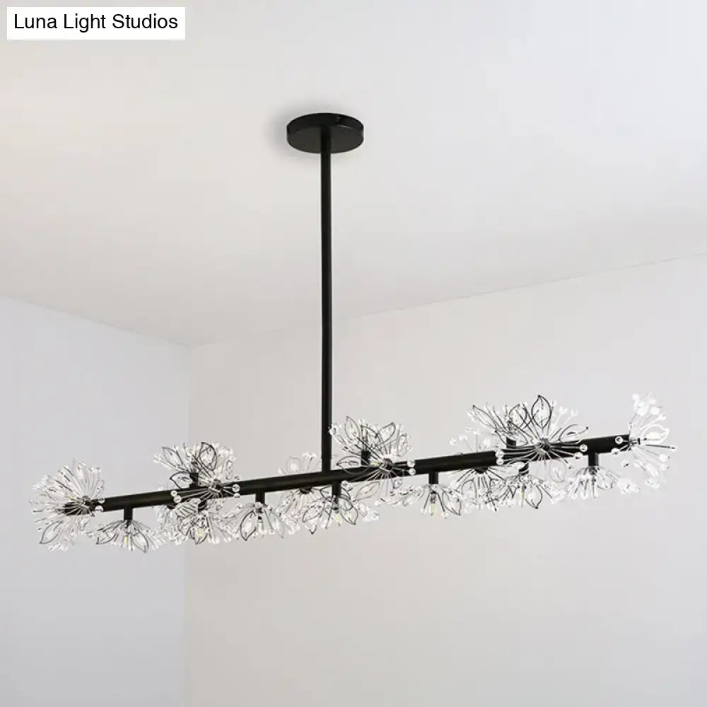 Modern black island pendant light featuring clear crystal flower fixtures for elegant dining room decor
