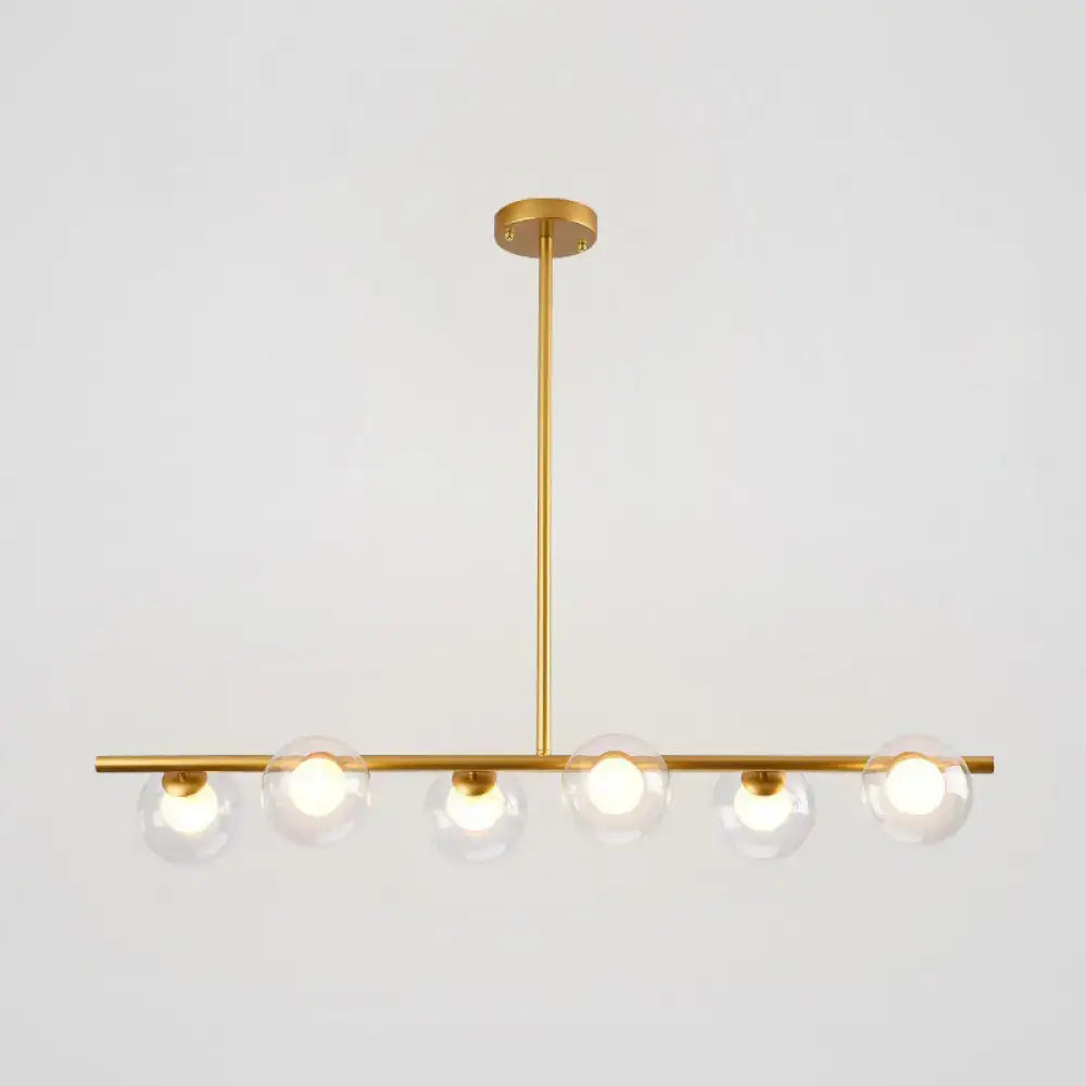 Modern black gold island pendant with five clear glass globe bulbs for dining room lighting
