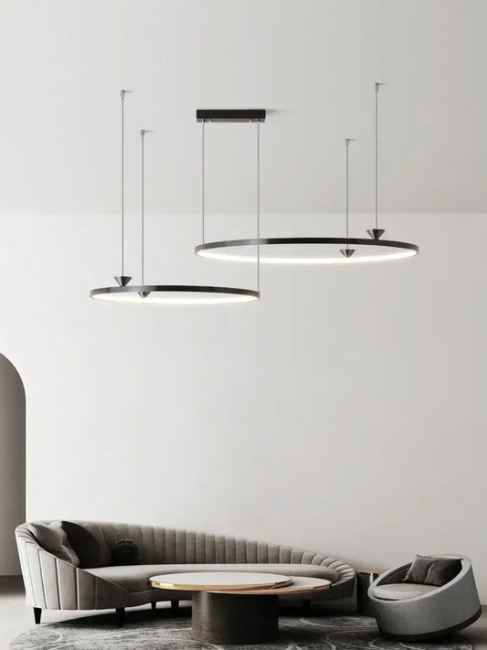 Modern black italian style annular pendant lamp with sleek circular frames and integrated led lighting for dining room decorbites italian style