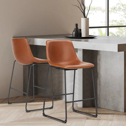 Modern black leather bar stools with gold stitching for kitchen island - Decorbites