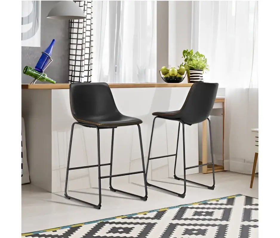Modern black leather bar stools with gold stitching for kitchen island - Decorbites