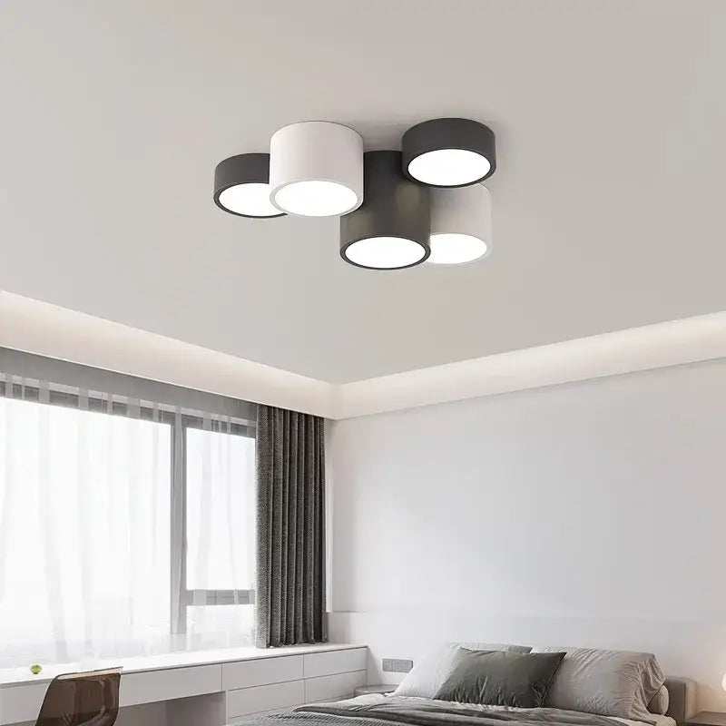 Modern black led ceiling lamp with five cylindrical black and white shades for living room with circular bulbs