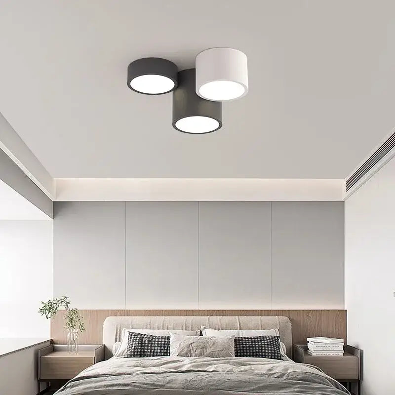 Modern black led ceiling lamp with three cylindrical matte shades and circular bulbs for living room ceiling lamp