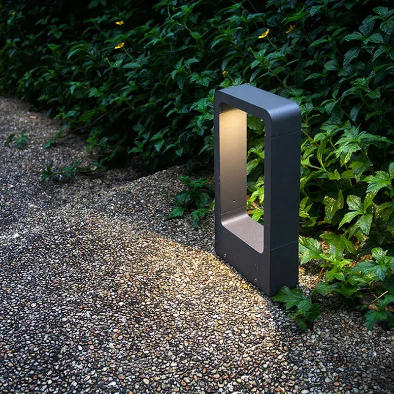 Modern black led garden light rectangular outdoor wall lamp with matte finish and warm interior illumination