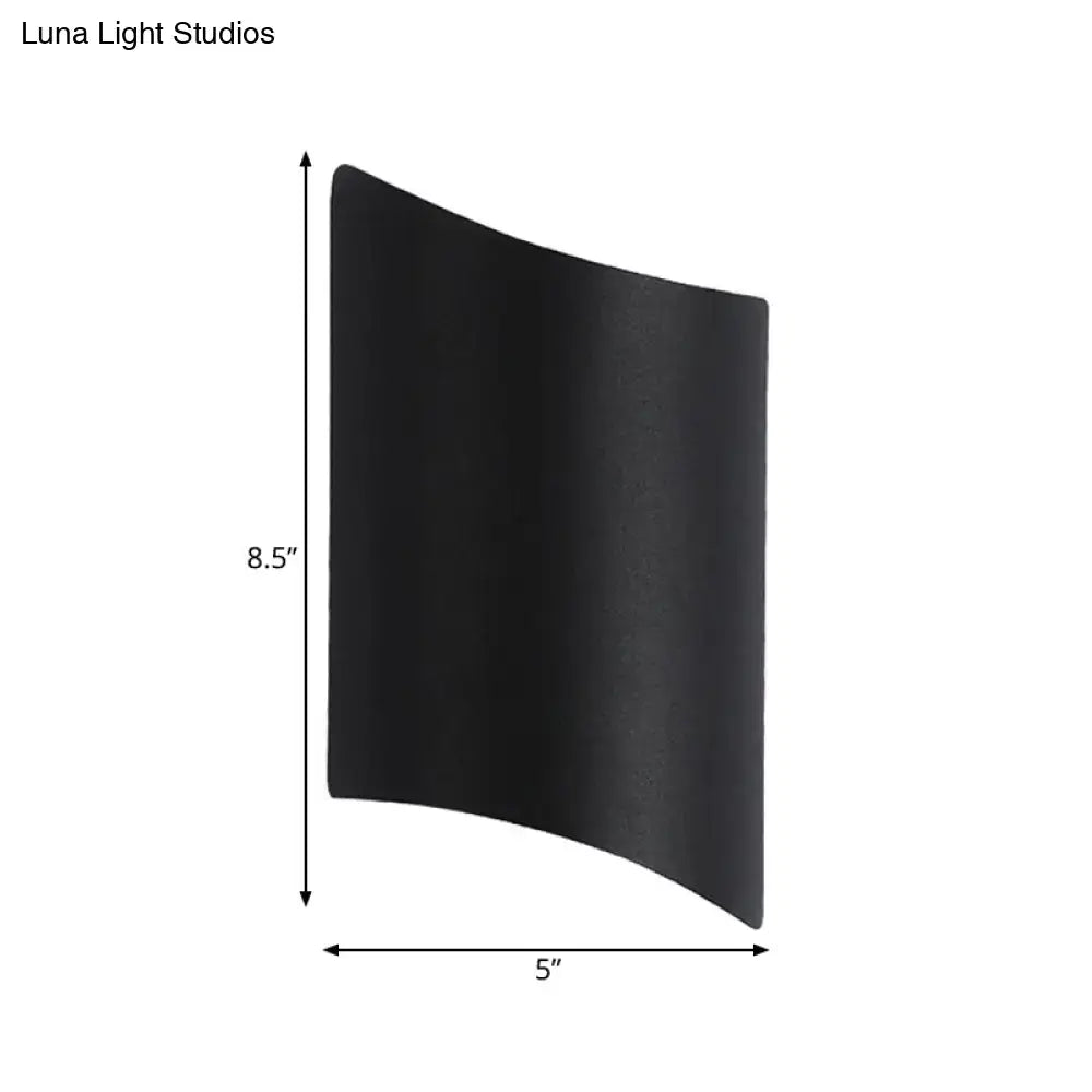 Modern black led outdoor wall sconce with a sleek curved design as a stylish led outdoor wall light fixture