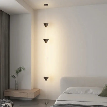 Modern black led pendant light with three matte bronze triangular shades suspended by thin cables for dining room decorbites black modern