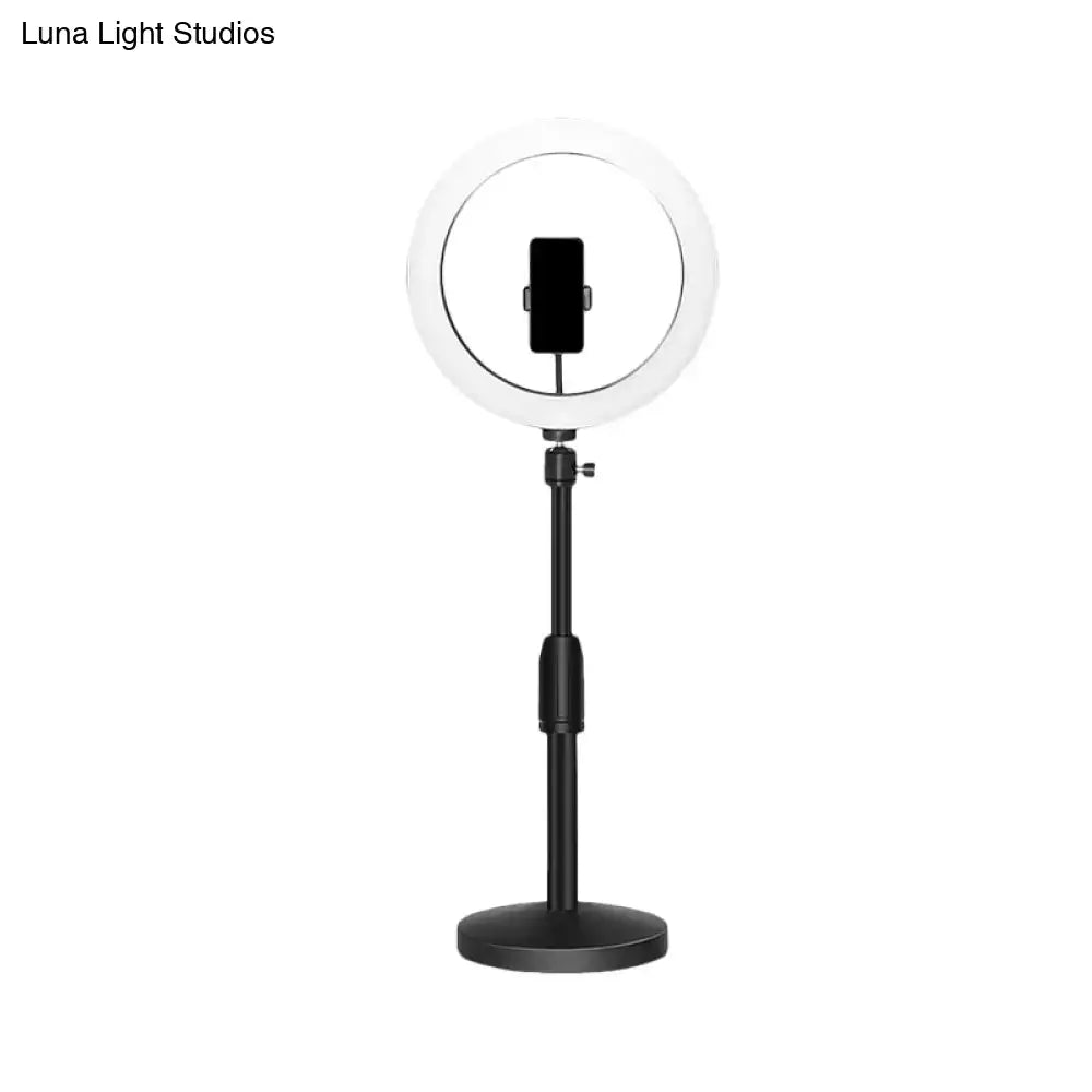 Modern black led ring flash light with phone holder wall light featuring adjustable stand and circular white ring light