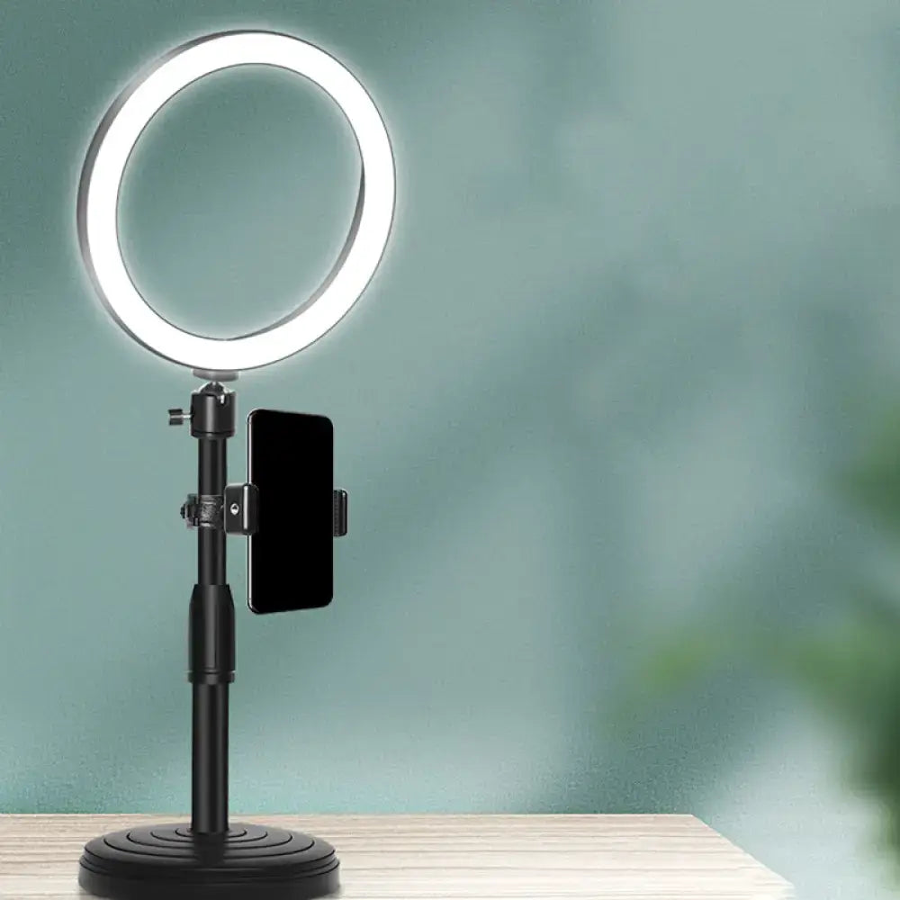 Modern black led ring flash light with adjustable stand and phone holder ideal as bedroom lamp or wall light