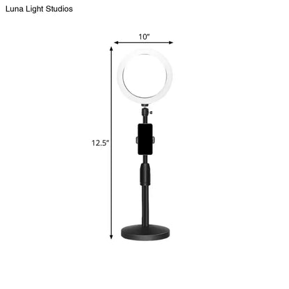 Modern black led ring flash light with phone holder by luna light studios featuring a 10-inch circular ring light wall light