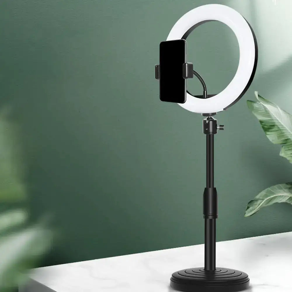 Modern black led ring flash light with adjustable stand and phone holder used as wall light and bedroom lamp